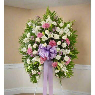 White Lavender Standing Spray sympathy floral arrangement.