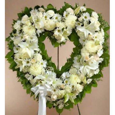 White Standing Heart with white lilies and roses on a standing easel.