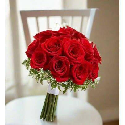 red bridal bouquet with red roses and white ribbon with greens - Flower Shop in Hollywood