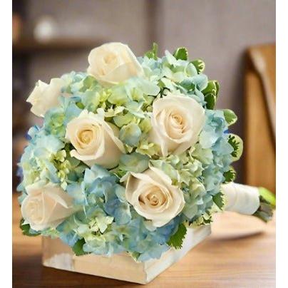 Toss Bouquet  white and blue with white roses and blue hydrangeas